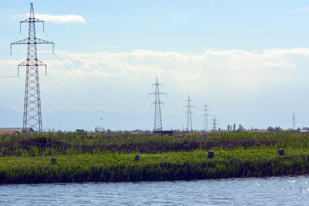 Electricity pylons on the shore of the Volga Riverの写真素材