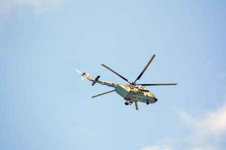 Helicopter flying in the blue sky, Moscow region, Russiaの写真素材