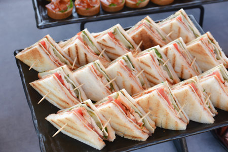 Sandwiches on a plate in a restaurant, close-upの写真素材