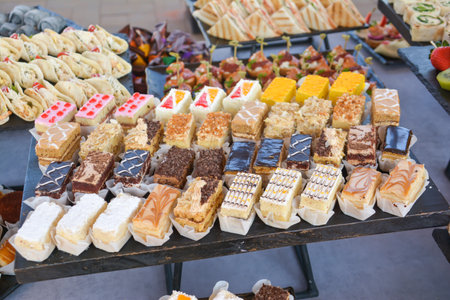 Variety of pastries on display at a market in Barcelona, Spainの写真素材
