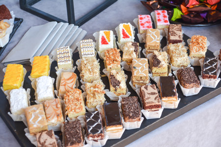 Candy bar with different kinds of sweet cakes and pastries.の写真素材