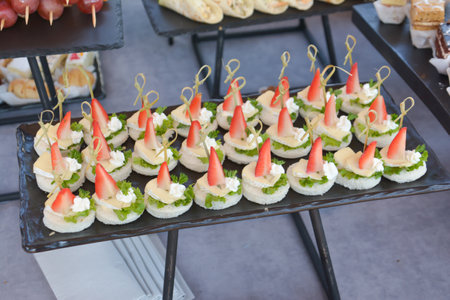 Catering food on a table in a restaurant. Canapesの写真素材