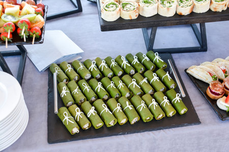 Catering buffet food indoor in luxury restaurant with meat colorful fruits and vegetablesの写真素材