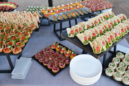 catering food for events, canapes on the buffet tableの写真素材