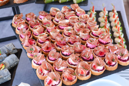 catering buffet food for events - canapes and food on tableの写真素材