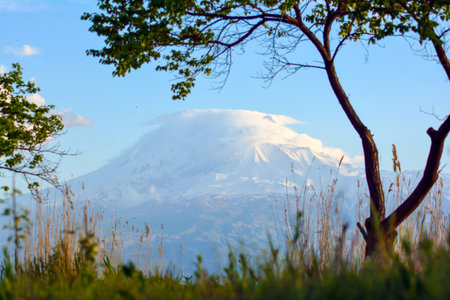 Beautiful volcanic mountain with view of lake and forests. Natural landscape with mountain and river. Scenic nature view from Armeniaの写真素材