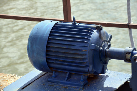 A blue electric motor on a bridge, close-up of photoの写真素材