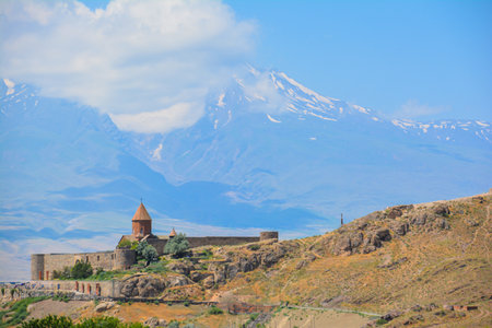 Church and beautiful natural landscape. Monastery in nature. Armenian Church in mount. Beautiful architecture of the church. Monastery against the backdrop of rocky mountains.の写真素材