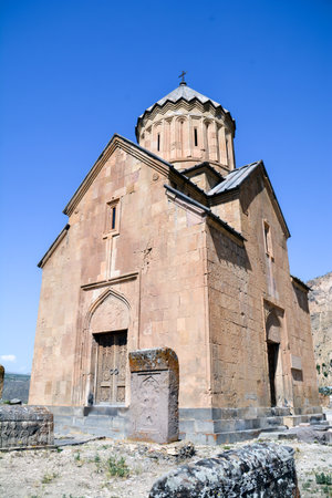 Church and beautiful natural landscape. Monastery in nature. Armenian Church in mount. Beautiful architecture of the church. Monastery against the backdrop of rocky mountains.の写真素材