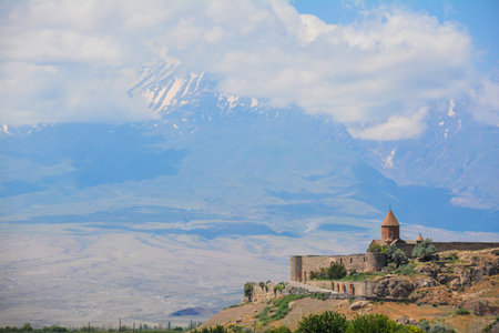 Church and beautiful natural landscape. Monastery in nature. Armenian Church in mount. Beautiful architecture of the church. Monastery against the backdrop of rocky mountains.の写真素材