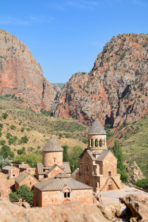 Church and beautiful natural landscape. Monastery in nature. Armenian Church in mount. Beautiful architecture of the church. Monastery against the backdrop of rocky mountains.の写真素材