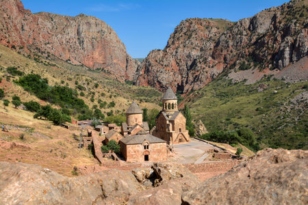 Church and beautiful natural landscape. Monastery in nature. Armenian Church in mount. Beautiful architecture of the church. Monastery against the backdrop of rocky mountains.の写真素材