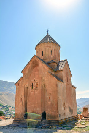 Church and beautiful natural landscape. Monastery in nature. Armenian Church in mount. Beautiful architecture of the church. Monastery against the backdrop of rocky mountains.の写真素材