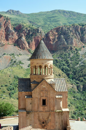 Church and beautiful natural landscape. Monastery in nature. Armenian Church in mount. Beautiful architecture of the church. Monastery against the backdrop of rocky mountains.の写真素材