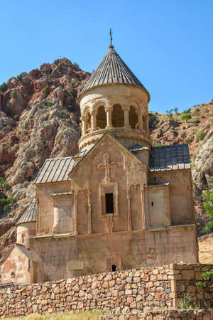 Church and beautiful natural landscape. Monastery in nature. Armenian Church in mount. Beautiful architecture of the church. Monastery against the backdrop of rocky mountains.の写真素材