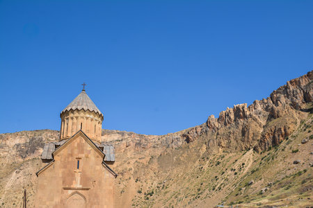 Church and beautiful natural landscape. Monastery in nature. Armenian Church in mount. Beautiful architecture of the church. Monastery against the backdrop of rocky mountains.の写真素材