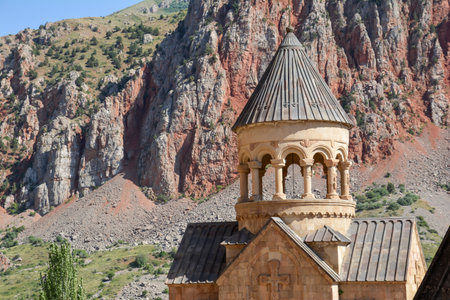 Church and beautiful natural landscape. Monastery in nature. Armenian Church in mount. Beautiful architecture of the church. Monastery against the backdrop of rocky mountains.の写真素材