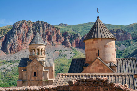 Church and beautiful natural landscape. Monastery in nature. Armenian Church Noravank. Beautiful architecture of the church. Monastery against the backdrop of rocky mountains.の写真素材