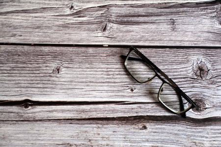 Glasses on a wooden background. Selective focus. nature.の写真素材