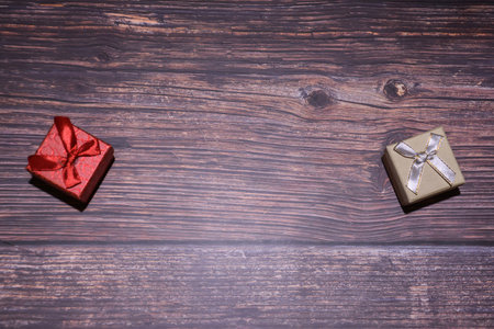 Gift boxes on wooden background. Top view with copy space.の写真素材