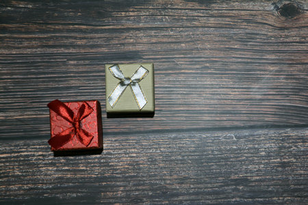 Gift boxes on wooden background. Top view with copy space.の写真素材