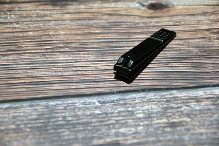 Scissors on a wooden background. Hairdresser's tools. Cutting shears. Scissors lie on a table.の写真素材