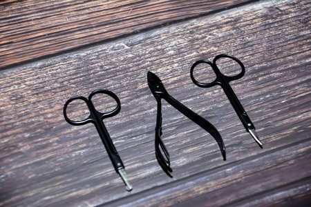 Tools for manicure and pedicure on a wooden background.の写真素材