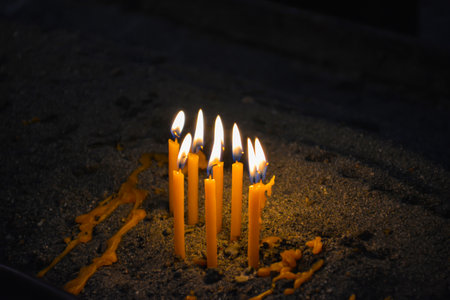 Burning candles with flame. Burning candles in the church
