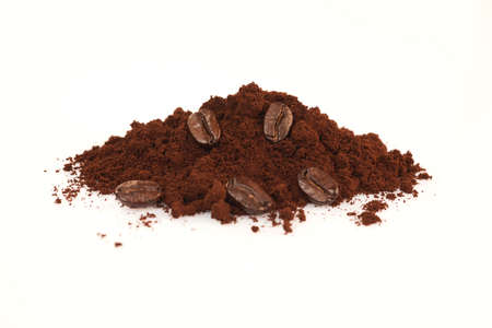 coffee beans and coffee ground on white backgroundの写真素材