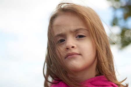 Portrait of a little girl in a park