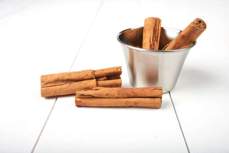 Cinnamon sticks isolated on white backgroundの写真素材