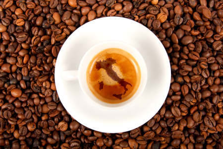 Cup of Italian espresso with roasted coffee beansの写真素材