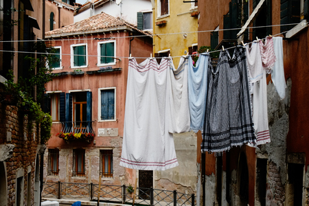 Clothesline with laundry in the streets of beautiful Venice, Italyの写真素材