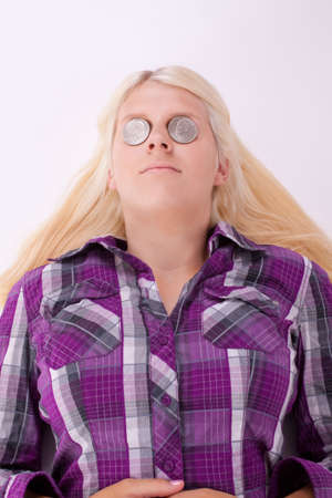 Coins on the eyesの写真素材