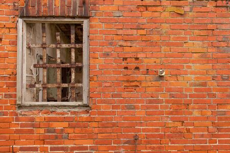 A window in an old ruined wall