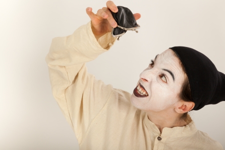 The clown with a purse in his handの写真素材