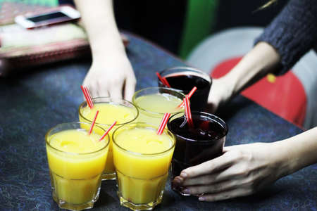Glasses of juice on selective focus