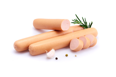 Frankfurter sausage isolated on white background with herbs and peppercornsの写真素材