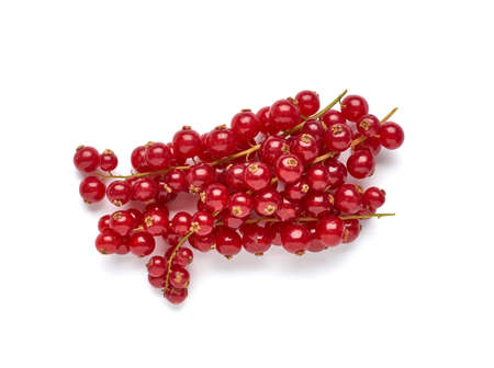 Creative layout made of red currant on the white background. Flat lay. Food concept.