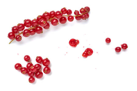 Creative layout made of red currant on the white background. Flat lay. Food concept.