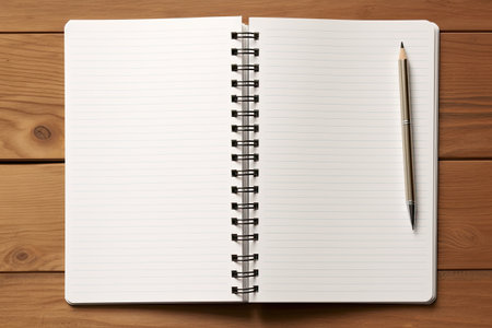 A top view of an empty notebook on a wooden desk, accompanied by a pen. It serves as a creative...