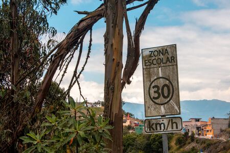 school zone in remote area of the city, neglected signの写真素材