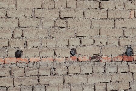 adobe background, mud bricks, old wall brown wallの写真素材
