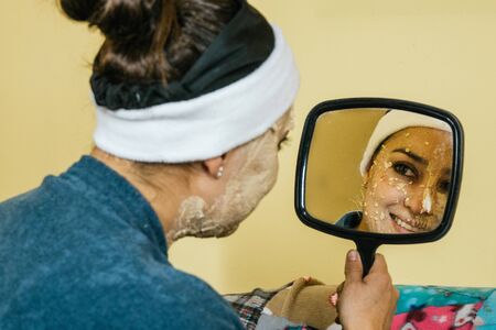 person resting and undergoing beauty treatment, oatmeal maskの写真素材