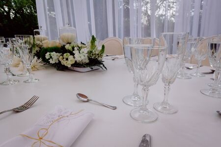 decoration elements for banquets and parties, chocolate, candles, flowers, glassesの写真素材