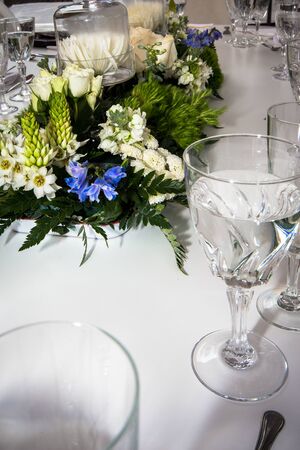 decoration elements for banquets and parties, chocolate, candles, flowers, glassesの写真素材