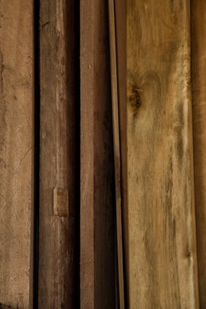 vertically standing wooden planks background, fresh woodの写真素材