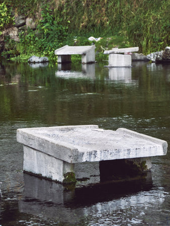 Washing in the Wild: Public Laundry Facilities in a Riverの写真素材
