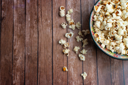 Watching a movie with popcorn.の写真素材