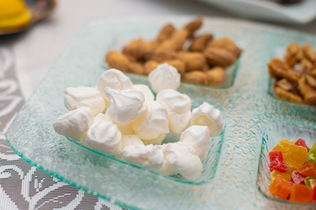 Sweet marshmallow, walnuts and nutsの写真素材